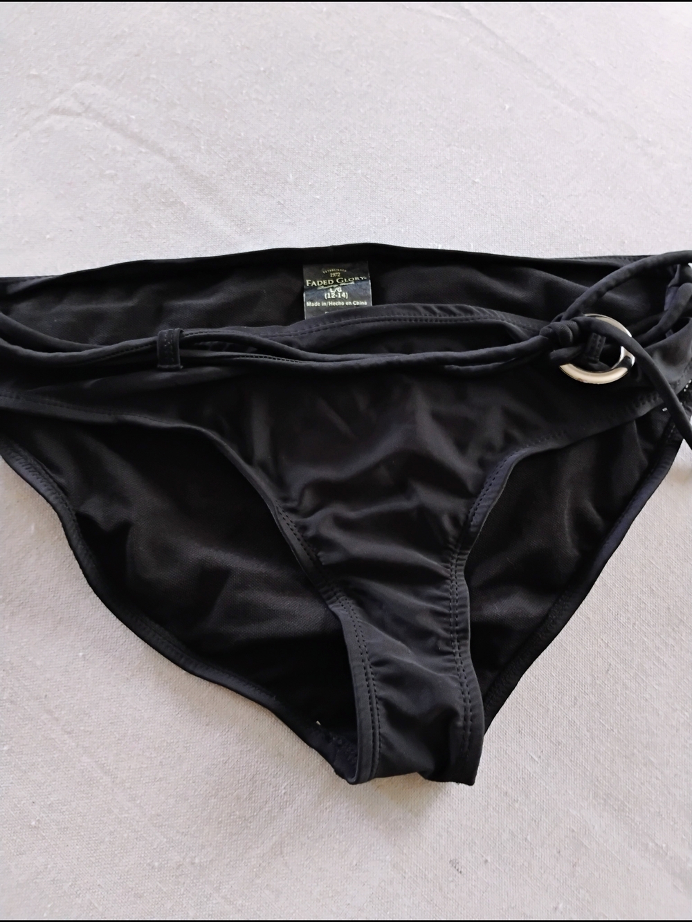 NEW... Without Tags Faded Glory Black Swim with Side Ring Detail Size L..12/14
